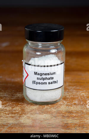 A jar of magnesium sulphate (or magnesium sulfate) Epsom salts as used in a UK secondary school, London, UK. Stock Photo