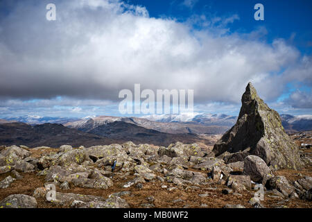 Cumbria / UK - April 5th 2018: The English Lake District where Skiddaw and Helvellyn can be seen from Matterhorn rock on Grey Friar Stock Photo