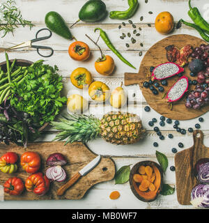 Helathy vegan food cooking background with uncooked fruites and vegetables Stock Photo