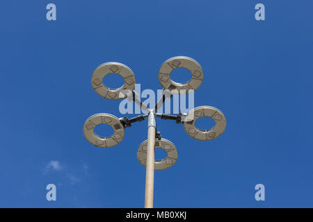 Modern street light against blue sky Stock Photo