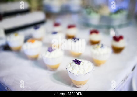 Mousse meringue dessert in cups (or panna cotta) Stock Photo