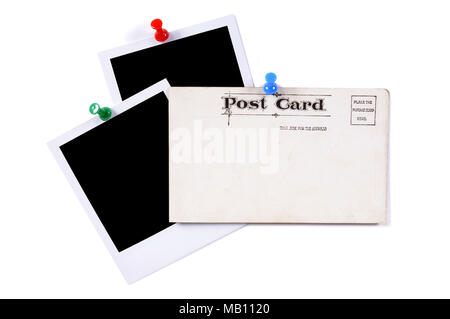 Old stained and faded postcard with blank photo prints on a white background Stock Photo