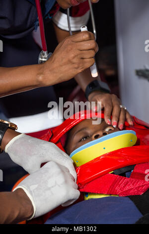 Pretoria, South Africa, April 3 - 2018: Paramedics checking if patient is conscious. Stock Photo