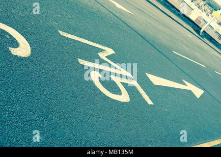 Road markings showing the way to the M5 motorway - filter applied Stock Photo