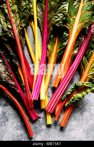 Freshly picked rainbow chard with multicoloured stems. Stock Photo