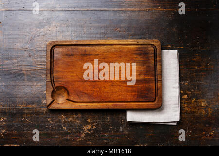 Wooden cutting board background and cloth napkin on wooden table background copy space Stock Photo