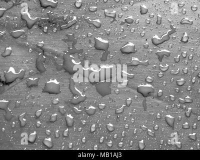 water drops on silver metallic surface Stock Photo