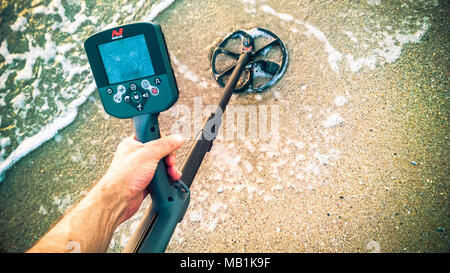 australian pro metal detector Minelab CTX 3030 at the beach Stock Photo