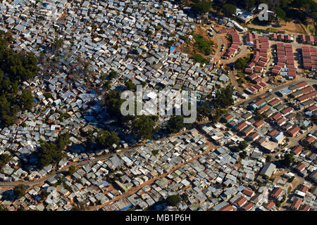 Imizamo Yethu township, Hout Bay, Cape Town, South Africa - aerial Stock Photo