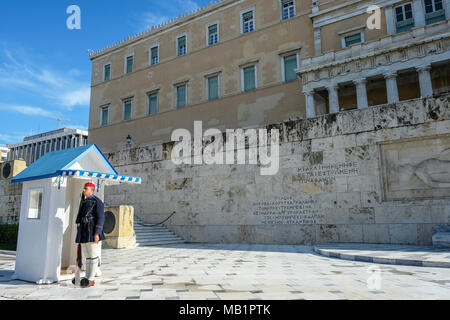 ATHENS, GREECE - DECEMBER 29, 2017: Changing of the guard at the Tomb of the Unknown Soldier in Syntagma Square at the Greek Parliament in Athens. Stock Photo