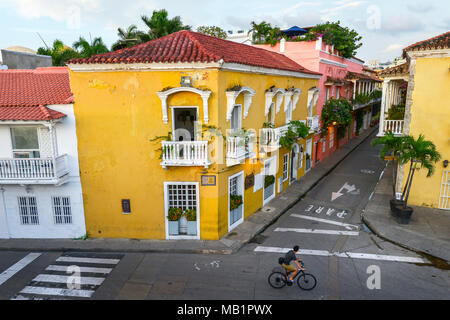 Cartagena, Colombia - August 3, 2017: An unidentified man on a bicycle on a street in Cartagena in Colombia. Stock Photo