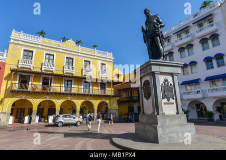 Cartagena, Colombia - August 3, 2017: Unidentified people walking through the Plaza de los Coches, next to the statue of Pedro Heredia in Cartagena. Stock Photo