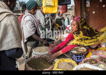 Lalibela, Ethiopia - January 6, 2018: An unidentified woman selling spices at the Lalibela market in Lalibela, Ethiopia. Stock Photo