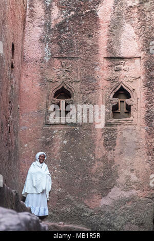 LALIBELA, ETHIOPIA - JANUARY 6, 2018: Portrait of an woman in Bet Mikael, one of the churches excavated in the rock of Lalibela in Ethiopia. Stock Photo