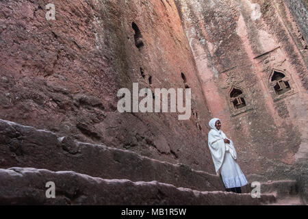 LALIBELA, ETHIOPIA - JANUARY 6, 2018: Portrait of an woman in Bet Mikael, one of the churches excavated in the rock of Lalibela in Ethiopia. Stock Photo