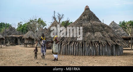 Omo Valley, Ethiopia - January 26, 2018: Two unidentified women of the Karo tribe speaking in their village in Omo valley, Ethiopia. Stock Photo