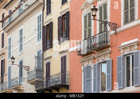 Balconies and windows on the colourful buildings found in Piazza di Spagna, Rome, Italy. Stock Photo