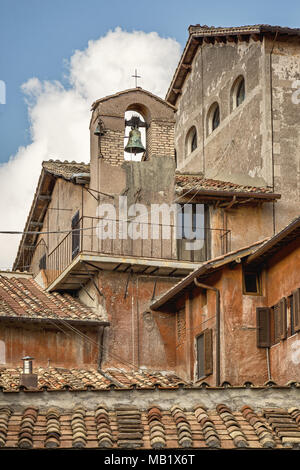 The bell tower and rooftops of San Bonaventura al Palatino, the 17th century Franciscan monastery on Palatine Hill in Rome, Italy. Stock Photo