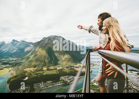 Couple Man and Woman sightseeing mountains landscape Family love and Travel happy emotions Lifestyle adventure vacations concept traveling together in Stock Photo