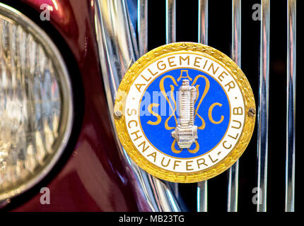 27 March 2018, Germany, Wolfsburg: A club emblem decorates the hood of the Jaguar S-Type belonging to vintage car collector Horst F. Beilharz. Photo: Hauke-Christian Dittrich/dpa Stock Photo