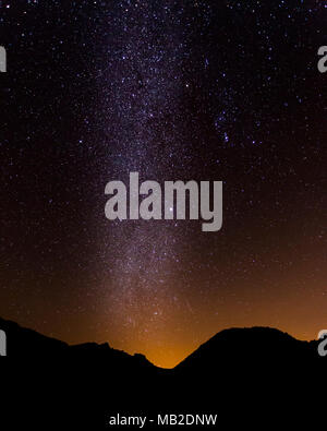 Milky way over mountains in Teide National Park, Tenerife at night Stock Photo