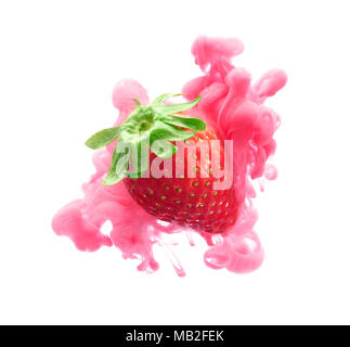Strawberry on ink isolated over white background Stock Photo