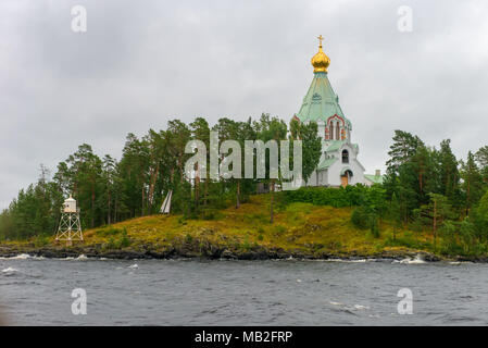 Saint Nicholas Island (skete) in stormy rainy weather. Valaam Transfiguration monastery. Evening shot. Karelia. Russia. Stock Photo