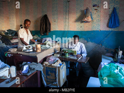 Somali men working in a tailor shop, Woqooyi Galbeed region, Hargeisa, Somaliland Stock Photo
