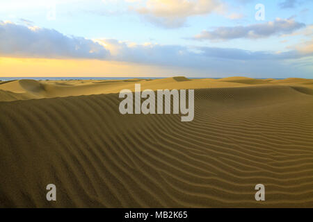 Rippled and smooth sand of dunes of Maspalomas in Gran Canaria. Stock Photo