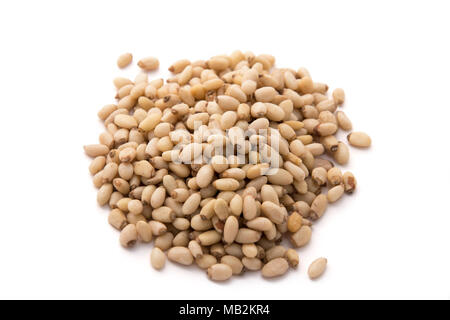a pile of pine nuts isolated on white background Stock Photo