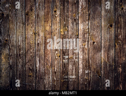 Rustic wood planks background with nice studio lighting and elegant vignetting to draw the attention. Stock Photo