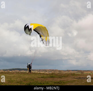 A Paramotorer preparing to fly Stock Photo
