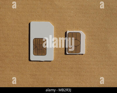 SIM and USIM cards used in mobile telephony devices such as phones and smart phones Stock Photo
