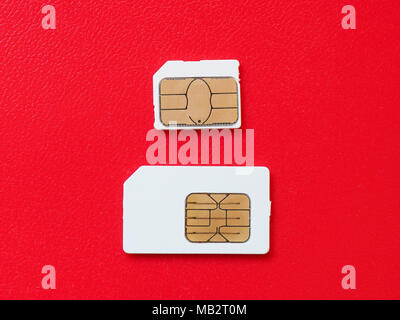 SIM and USIM cards used in mobile telephony devices such as phones and smart phones Stock Photo