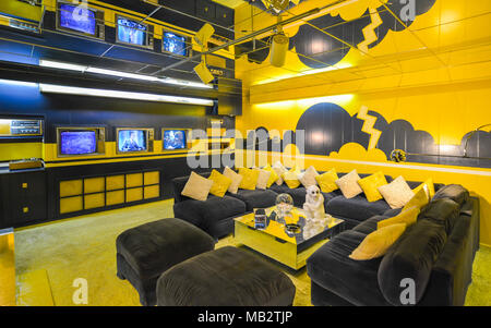 Memphis, TN - Sep. 21, 2017: Entertainment room in Elvis Presley's Graceland Mansion. Mansion is listed in the National Register of Historic Places. Stock Photo