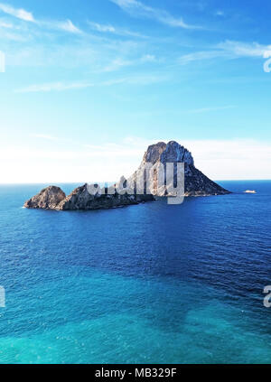 Es Vedra and es Verdranell on Ibiza Island. Famous rock formation with turquoise sea and blue sky. Stock Photo