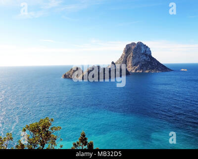 Es Vedra and es Verdranell on Ibiza Island. Famous rock formation with turquoise sea and blue sky. Stock Photo