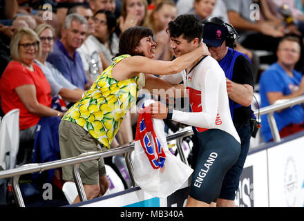 England's Charlie Tanfield (right) celebrates winning gold in the Men's 4000m Individual Pursuit Finals - Gold at the Anna Meares Velodrome during day two of the 2018 Commonwealth Games in the Gold Coast, Australia. Stock Photo