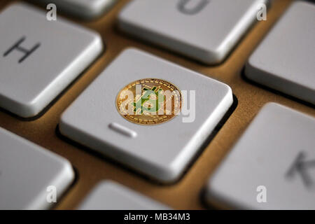 Bitcoin icon symbol on computer keyboard Stock Photo