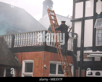 1940's re-enactor as a member of the NFS at the Golf hotel Woodhall Spa Stock Photo