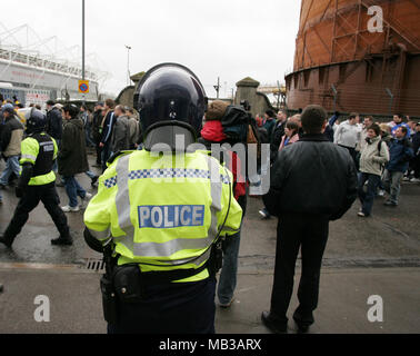 Police on guard at the local derby clash between Southampton and Portsmouth as fans arrive at St Marys stadium Southampton home ground for an FA cup tie. Stock Photo
