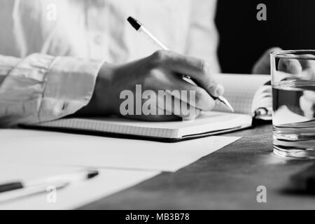 Man Hand writing Homework with black marker on visual screen Stock ...