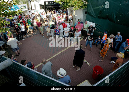 Twenty20 cricket fans children and adults many in fancy dress play cricket  in between games at the Rose Bowl Hampshire during finals day in 2008. Stock Photo