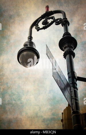 Vintage style lamp post and traffic light in New York City with retro grunge texture Stock Photo
