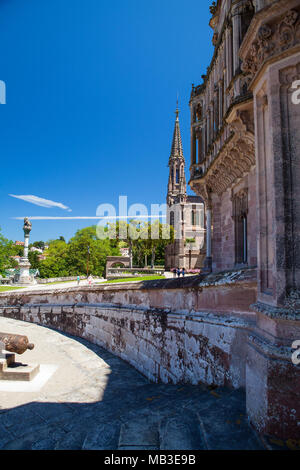 Comillas, Spain - July 3, 2017: Palacio de Sobrellano in the village of Comillas, Spain. Built in 1888, Palacio de Sobrellano is a neo Gothic building Stock Photo