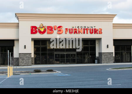 a bob's discount furniture logo seen on a retail store front in