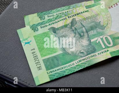 South African  Ten Rand banks notes with image of a  rhinoceros Stock Photo