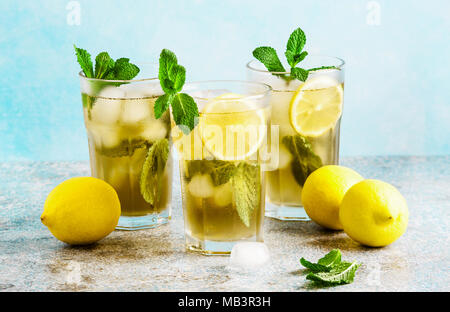 Traditional iced tea with lemon and ice in tall glasses Stock Photo
