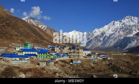 Beautiful landscape in the Langtang valley, Nepal. Snow covered mountains and village Kyanjin Gumba. Stock Photo