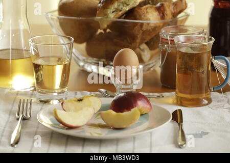 breakfast with fresh rolls fruits and tea Stock Photo